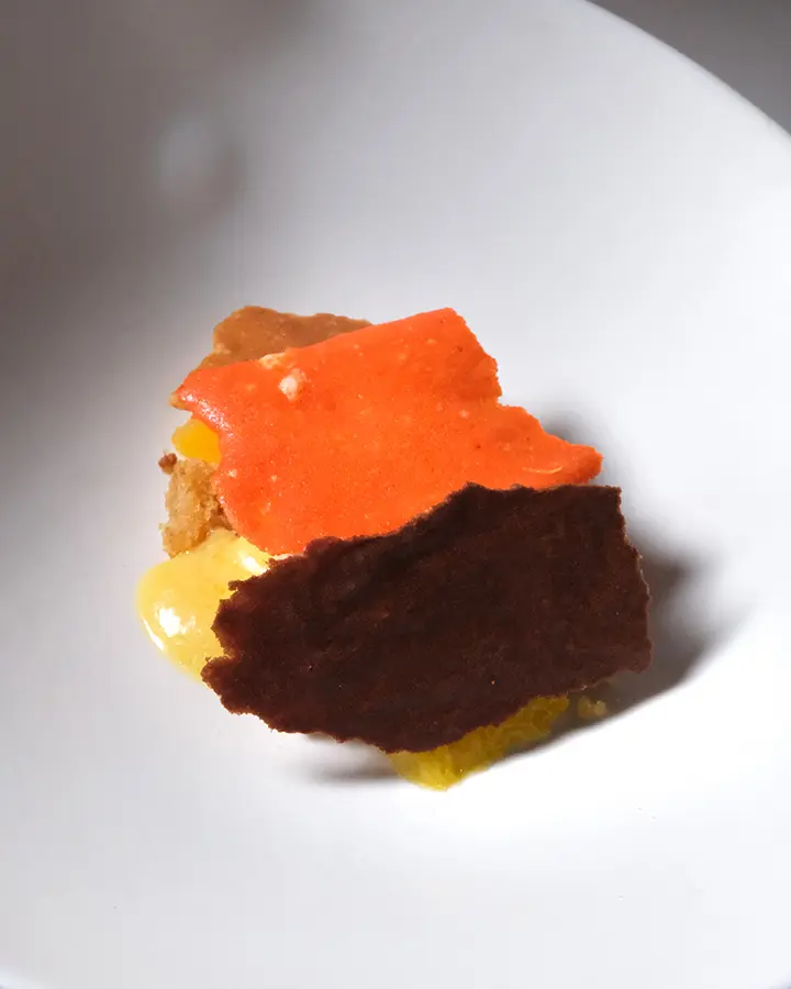 Postre a base de naranjas y tejas de castaña