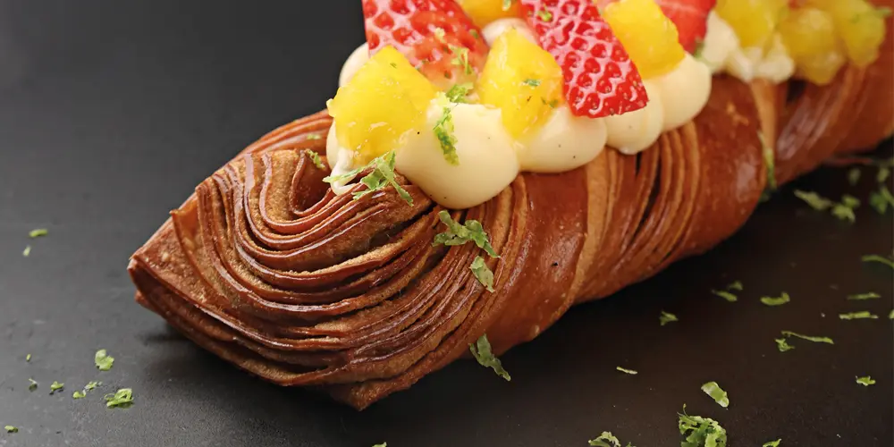 Imagen de Brioche trenzado con crema pastelera de vainilla y piña caramelizada de Oriol Carrió