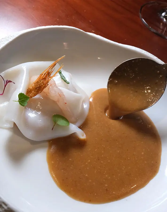 Suquet con velo de calamar