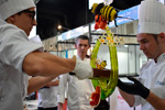 Lucas Carballo y Gonzalo Gil finalizando su pieza artística