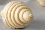 Croissant crudo enrollado
